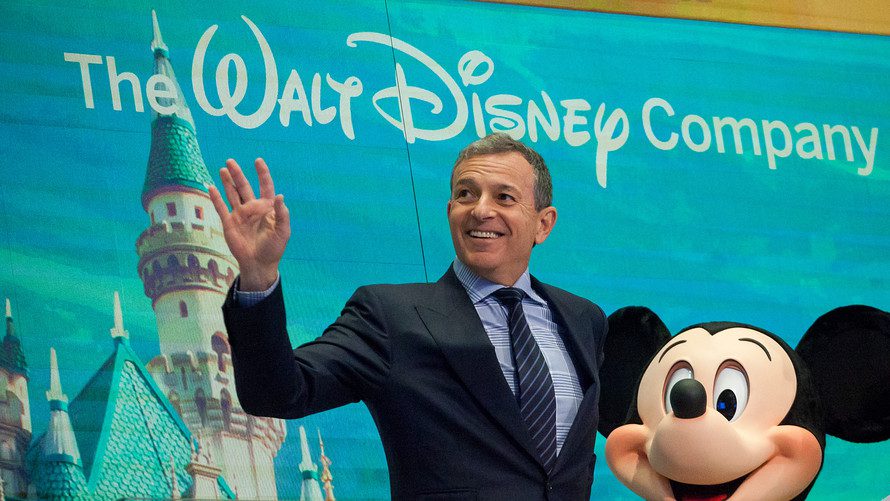 Bob Iger waves with Mickey